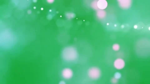 Bokeh lights motion graphics with green screen background Stock Footage 135554594