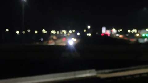Bokeh lights at night. blur lights at night. defocused vehicle lights. blurry Stock Footage 285959490