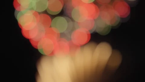 Bokeh lights of real fireworks exploding in the sky during a celebration Video stock 319807286
