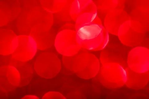 Bokeh lights red texture. New year background. Stock Photos