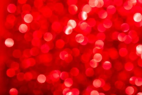 Bokeh lights red texture. New year background. Stock Photos