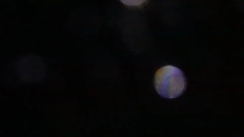 Bokeh moving left and right in the dark Video stock 309254734