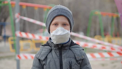 Bokeh portrait of a smiling small boy in a knitted hat. Stock Footage 127495743