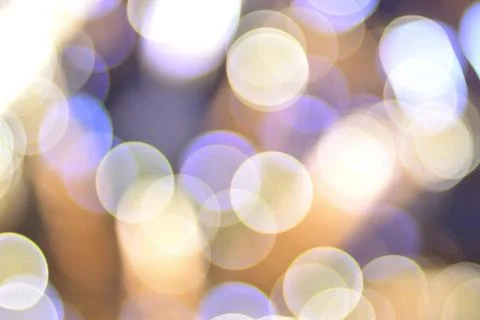 Bokeh of purple and violet lights with blur background. Stock Photos