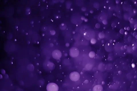 Bokeh purple proton Stock Photos