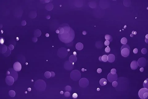 Bokeh purple proton Stock Photos