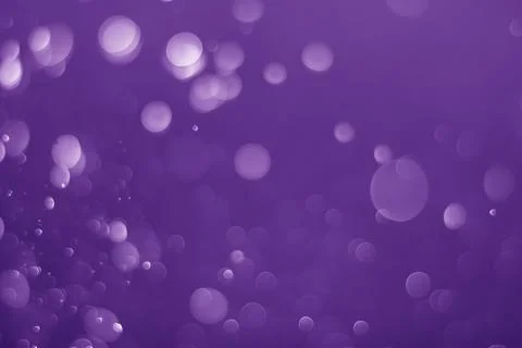 Bokeh purple proton Stock Photos