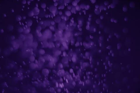 Bokeh purple proton Stock Photos