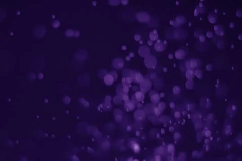Bokeh purple proton Stock Photos