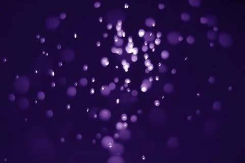 Bokeh purple proton Stock Photos