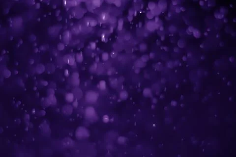 Bokeh purple proton Stock Photos