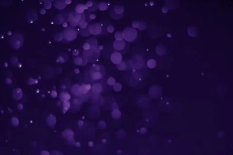 Bokeh purple proton Stock Photos