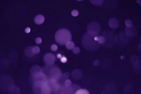 Bokeh purple proton Stock Photos
