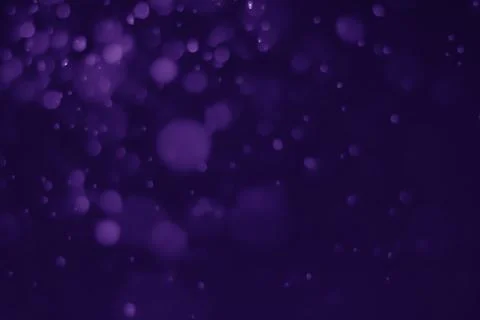 Bokeh purple proton Stock Photos