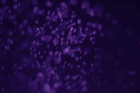 Bokeh purple proton Stock Photos