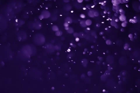 Bokeh purple proton Stock Photos