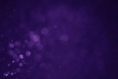 Bokeh purple proton Stock Photos