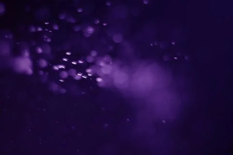 Bokeh purple proton Stock Photos