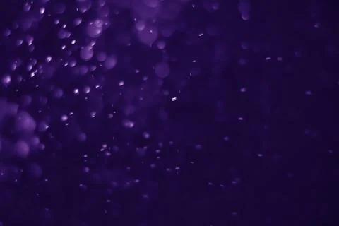 Bokeh purple proton Stock Photos
