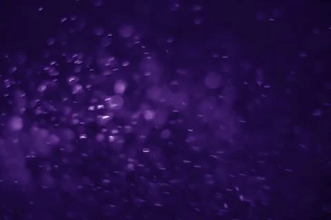Bokeh purple proton Stock Photos