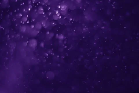 Bokeh purple proton Stock Photos