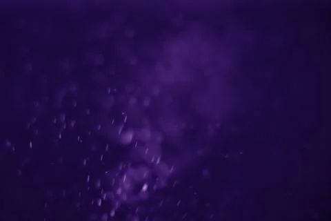 Bokeh purple proton Stock Photos