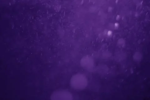 Bokeh purple proton Stock Photos