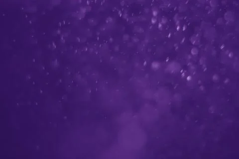 Bokeh purple proton Stock Photos