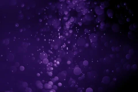 Bokeh purple proton Stock Photos