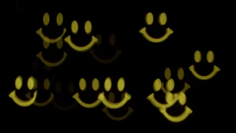 A bokeh in the shape of a smiley face Stock Footage 302080777