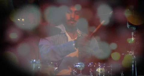 Bokeh shifting, drummer emerging, raising stick, striking drums and cymbal, Stock Footage 333967330