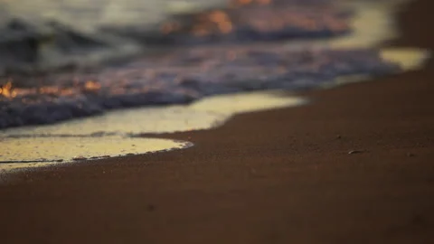 Bokeh shot of sun reflection on waves Stock Footage 213018407