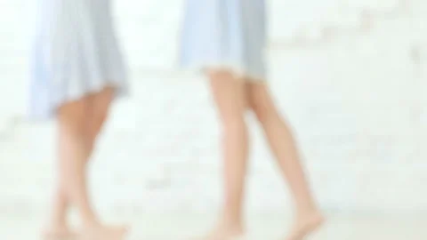 Bokeh shot, two pretty young blonde woman posing for photos Stock Footage 88959965