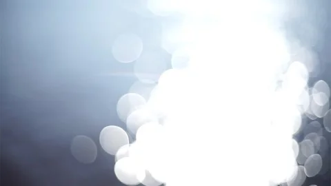 Bokeh sun glare reflected in blue water surface. Stock Footage 293715933