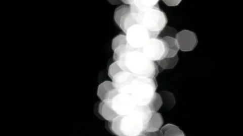 Bokeh sun glares reflected from dark water stream Stock Footage 22037822