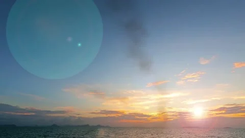 Bokeh sun light ray n sunbeam lens flare on golden sunset blue sky Stock Footage 161221777