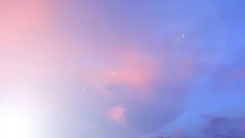 Bokeh sun light ray n bright lens flare sunbeam shine through pastel pink cloud Stock Footage 204963565