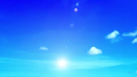 Bokeh sun light ray or sunbeam lens flare n white cloud on bright blue sky Stock Footage 253577816