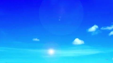 Bokeh sun light ray or sunbeam lens flare n white cloud on bright blue sky Stock Footage 253612322