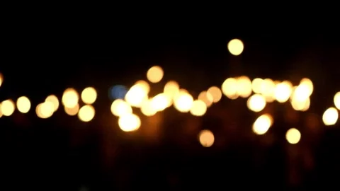 Bokeh of torches that people carry while walking Stock Footage 280685883