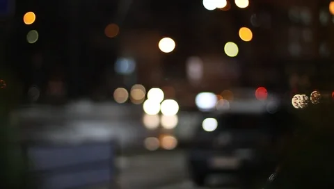 The bokeh traffic light at night in the street of a city Stock Footage 101730536