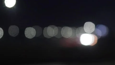 Bokeh traffic lights blur at night Stock Footage 321978903