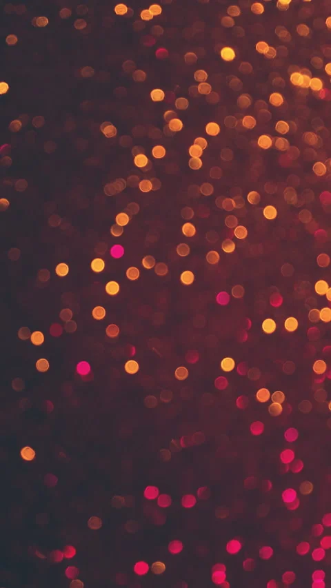 Bokeh vertical background of vibrant magenta and gold colors. Changing tiny Stock Footage 167550603