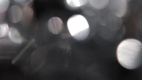 Bokeh video with full screen white bokeh lighting beams this round Видео 318061384