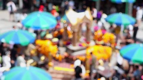 Bokeh view of blurred Erawan Shrine at Ratchaprasong Intersection. Stock Footage 283316106