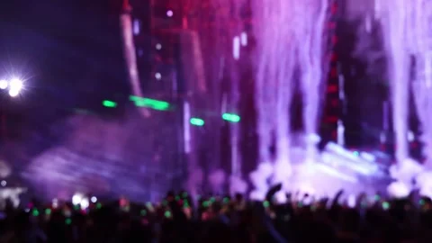 Bokeh view of people dancing on the dance floor during a concert show Stock Footage 327085643