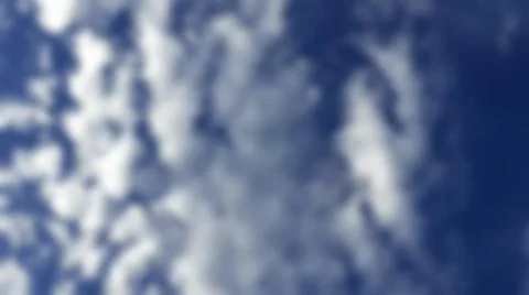 Bokeh white clouds, blue sky, the azure stratosphere, and spindrift. Stock Photos