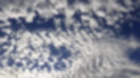 Bokeh white clouds, blue sky, the azure stratosphere, and spindrift. Stock-Fotos