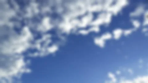 Bokeh white clouds, blue sky, the azure stratosphere, and spindrift. Stock Photos