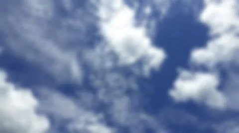 Bokeh white clouds, blue sky, the azure stratosphere, and spindrift. Stock Photos